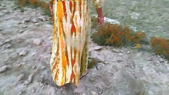 Desi Housewife And Husband Filmed Outdoors In Rural Setting