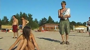 Fresh-Faced Teenage Girl Disrobes And Frolics In The Sun At A Public Beach