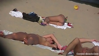 Hidden Camera Captures Passionate Couple In The Nude At A Beach